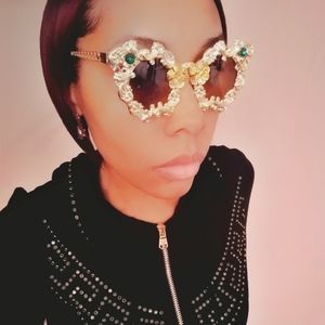 Gold floral design sunglasses
